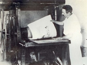 Louis Icart pulling a proof of Joy of Life from the etching press