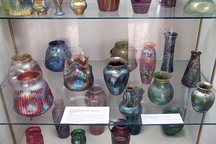 More great decorated Loetz, especially the vase in the front, on the left
