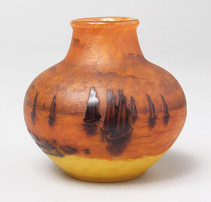 This bulbous 4-inch tall Daum vase has strong color and beautiful detail